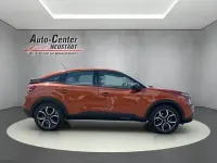 Używany Citroën e-C4 Feel 100 kW (136 KM) 2022 Pomarańczowy SUV
