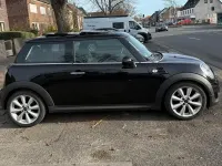 Gebraucht Mini Cooper 98 PS (72 kW) 2011 Schwarz Kleinwagen
