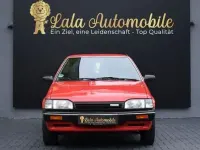Gebraucht Mazda 323 75 PS (55 kW) 1988 Rot Kleinwagen