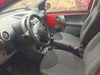 Gebraucht Toyota Aygo 68 PS (50 kW) 2007 Rot Kleinwagen