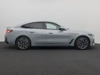 Gebraucht BMW i4 M Sport 210 kW (286 PS) 2023 M brooklyn grau metallicc4p Limousine