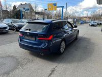 Gebraucht BMW 330e Advantage 252 PS (185 kW) 2022 Phytonicblau metallic Kombi