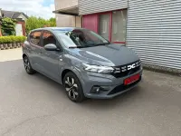 Używany Dacia Sandero Expression 91 KM (66 kW) 2025 Szary Sedan/Limuzyna
