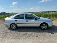 Gebraucht Mitsubishi Carisma 90 PS (66 kW) 1998 Silber Limousine