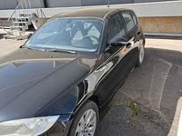 Second-hand BMW 116 122 CP (89 kW) 2004 Negru Hatchback