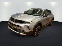 Gebraucht Opel Mokka-e Ultimate 100 kW (136 PS) 2022 Kontrast grau/quarz silber SUV