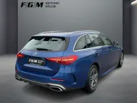 Gebraucht Mercedes C300e AMG line 313 PS (230 kW) 2024 Metalliclack spektralblau Kombi