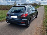 Gebraucht Peugeot 206+ 73 PS (53 kW) 2011 Grau Kleinwagen