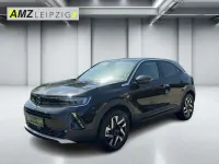 Gebraucht Opel Mokka-e Elegance 100 kW (136 PS) 2023 Lackierung schwarz perla nera/ SUV