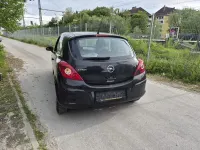 Używany Opel Corsa Edition 80 KM (58 kW) 2009 Czarny Hatchback