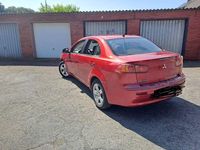 Gebraucht Mitsubishi Lancer 117 PS (86 kW) 2010 Rot Limousine