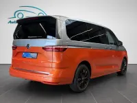 Second-hand VW Multivan Style 150 CP (110 kW) 2024 Portocaliu Monovolum