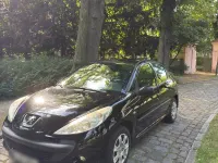 Gebraucht Peugeot 206+ 73 PS (53 kW) 2011 Schwarz Kleinwagen