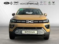 Gebraucht Dacia Spring Extreme 47 kW (65 PS) 2025 Safaribeige Kleinwagen