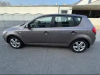 Używany Kia Ceed 109 KM (80 kW) 2009 Beżowy Hatchback