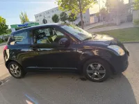 Usado Suzuki Swift 93 CV (68 kW) 2010 Negro Utilitario