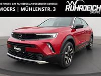 Gebraucht Opel Mokka-e Elegance 114 kW (156 PS) 2023 Power rot/kosmos rot SUV