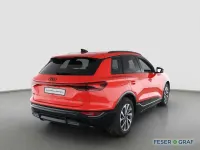 Gebraucht Audi Q6 e-tron Comfort 284 kW (387 PS) 2025 Rot (soneirarot metallic) SUV