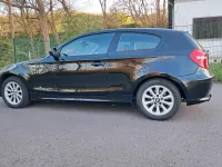 Używany BMW 116 125 KM (91 kW) 2010 Czarny Hatchback