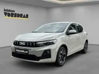 Neu Dacia Sandero Journey 101 PS (74 kW) 2025 Sandstone metallic Limousine