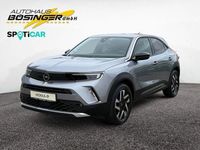 Gebraucht Opel Mokka-e Elegance 100 kW (136 PS) 2022 Kontrast grau/quarz silber SUV