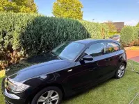 Gebraucht BMW 116 122 PS (89 kW) 2009 Schwarz Kleinwagen