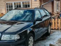 Używany Skoda Octavia 110 KM (80 kW) 2004 Czarny Kombi
