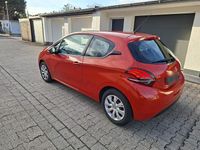 Gebraucht Peugeot 208 85 PS (62 kW) 2016 Orange Kleinwagen