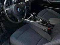 Używany BMW 116 122 KM (89 kW) 2010 Biały Hatchback