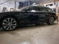 Używany Audi A6 Ambiente 245 KM (180 kW) 2014 Czarny Kombi