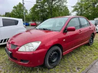 Second-hand Mitsubishi Lancer Comfort Edition 98 CP (72 kW) 2004 Roșu Berlinǎ