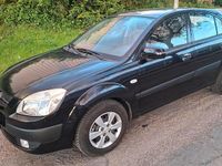 Second-hand Kia Rio 97 CP (71 kW) 2009 Negru Berlinǎ