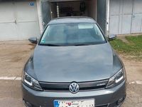 Używany VW Jetta Highline 170 KM (125 kW) 2013 Szary Sedan/Limuzyna