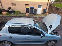Używany Peugeot 206 Premium 75 KM (55 kW) 2000 Srebrny Sedan/Limuzyna