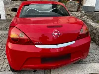 Używany Opel Tigra 90 KM (66 kW) 2005 Czerwony Kabriolet