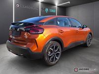 Gebraucht Citroën e-C4 Feel 100 kW (136 PS) 2022 Lackierung pulsorange/typ aus (metallic) Limousine
