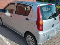 Gebraucht Daihatsu Cuore 69 PS (50 kW) 2012 Grau Kleinwagen