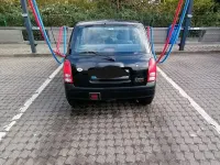 Gebraucht Daihatsu Cuore 56 PS (41 kW) 2002 Schwarz Kleinwagen
