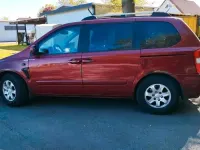 Brugt Kia Carnival 184 HK (135 kW) 2006 Rød MPV