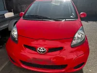 Gebraucht Toyota Aygo 68 PS (50 kW) 2011 Rot Kleinwagen