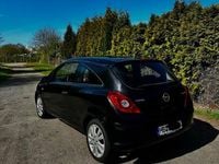 Second-hand Opel Corsa 60 CP (44 kW) 2009 Negru Hatchback