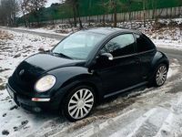 Gebraucht VW New Beetle 102 PS (75 kW) 2010 Schwarz Kleinwagen