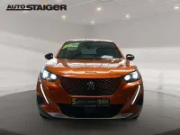 Gebraucht Peugeot e-2008 Active 100 kW (136 PS) 2023 Orange SUV