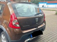 Gebraucht Dacia Sandero Stepway 75 PS (55 kW) 2012 Braun Limousine