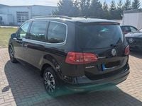 Second-hand VW Sharan 170 CP (125 kW) 2012 Negru Monovolum