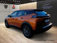 Second-hand Peugeot e-2008 Active 100 kW (136 CP) 2022 Portocaliu SUV