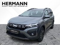 Gebraucht Dacia Jogger Expression 110 PS (80 kW) 2025 Dolomit grau / schiefer grau Van / Kleinbus