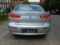 Gebraucht Mitsubishi Lancer Invite 109 PS (80 kW) 2010 Silber Limousine