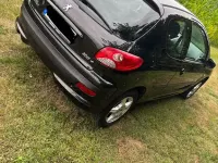 Gebraucht Peugeot 206 60 PS (44 kW) 2010 Schwarz Limousine