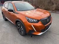 Second-hand Peugeot 2008 100 CP (73 kW) 2023 Portocaliu SUV